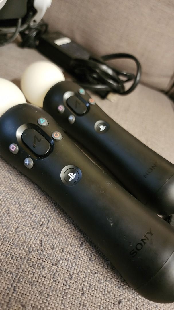 Sony PlayStation VR Bundle with Controllers and Camera (Category: PlayStation) located in Quezon City. Submitted by berniiie1 (Listing ID 1461654357, Image 2). Description: RUSH AND NEGOTIABLE Selling my Sony PlayStation VR 1, rarely used and just sitting in storage since I got a PS5. Inclusions: - PSVR unit - Processor Unit - PS Camera - 2x Move Controllers - Complete HDMI / USB / Power cables - I can include the PS4 Headset, but the ear muffs h