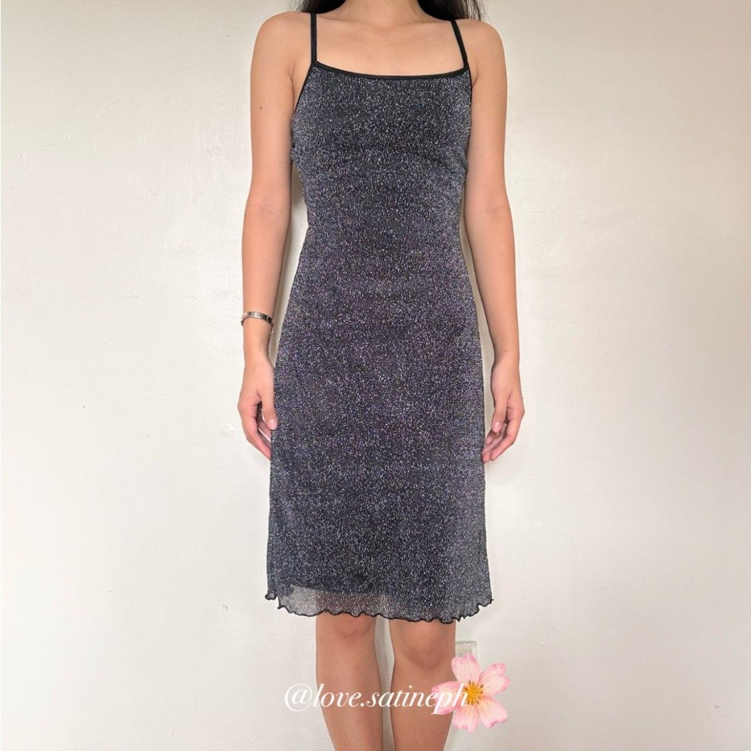 Sparkly Black Spaghetti Strap Mini Dress (Category: Dresses) located in Manila. Submitted by love.satineph (Listing ID 1461605664, Image 2). Description: - Black sparkly mini dress - Spaghetti straps - Lettuce hem detail - Glittery sheen fabric - Flattering fit - Ideal for parties or a night out.