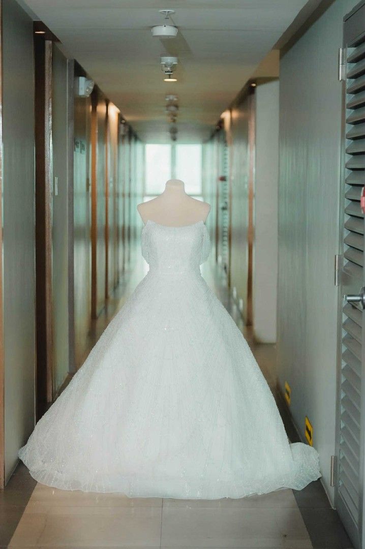 Sparkly Off-Shoulder Wedding GOWN (Category: Evening dresses & gowns) located in Bulacan. Submitted by Domozz (Listing ID 1461602944, Image 2). Description: - Intricate beadwork and sequins all over - Full ball gown skirt with a train - Zipper closure at the back - Designed for a princess-like feel on your wedding day - Perfect for grand celebrations.
