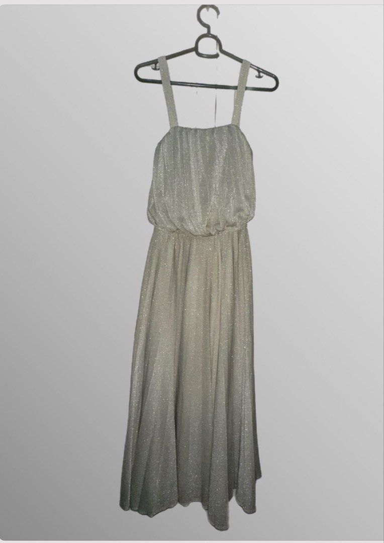 Sparkly Silver Maxi Dress with Straps (Category: Dresses) located in Makati City. Submitted by allexxii (Listing ID 1461675627, Image 1). Description: - Sparkly silver maxi dress - Gathered empire waist - Wide straps - Shimmering glitter effect fabric - Floor-length - Ideal for parties and special occasions - Festive and eye-catching design -Length by inches from shoulder 48 inches .