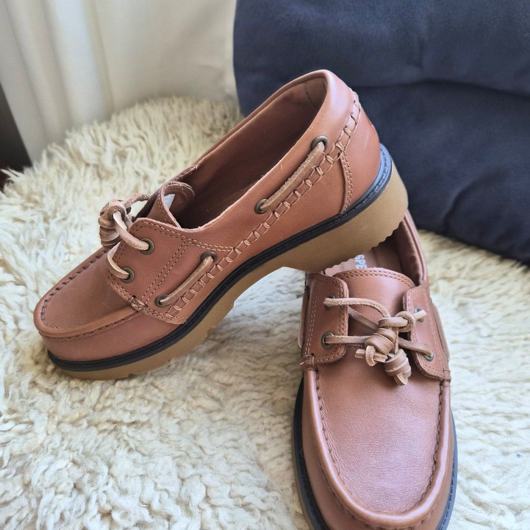 Sperry Brown Leather Boat Shoes (Category: Sneakers) located in Quezon City. Submitted by deng43763 (Listing ID 1461568797, Image 2). Description: - Classic brown leather Sperry boat shoes - Comfortable plush step insole - Durable rubber sole with excellent grip - Lace-up closure for a secure fit - Ideal for casual wear or boating activities.