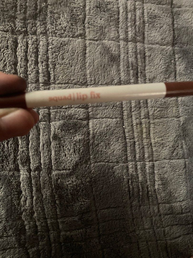Squad Lip Fix Lip Liner - Brown Shade (Category: Makeup) located in Makati City. Submitted by wonderfindzs (Listing ID 1461670883, Image 1). Description: - Squad brown lip liner - Twist-up style for easy application - Perfect for defining lips and creating everyday looks.