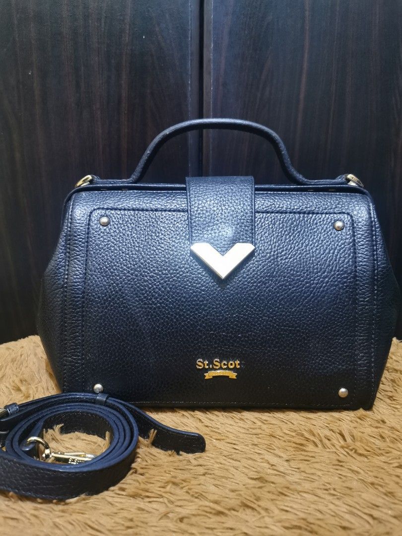 St. Scott Handbag (Category: Shoulder Bags) located in Aringay. Submitted by ycels_purselove (Listing ID 1461676832, Image 1). Description: St. Scott Handbag w/ sling Condition: well used Flaw: missing letter "T" on the hardware / light scratches on hardware.