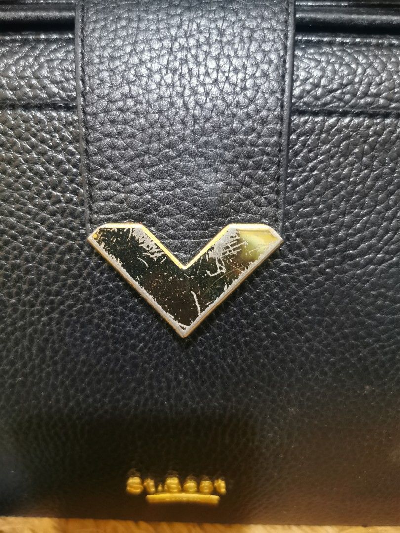 St. Scott Handbag (Category: Shoulder Bags) located in Aringay. Submitted by ycels_purselove (Listing ID 1461676832, Image 2). Description: St. Scott Handbag w/ sling Condition: well used Flaw: missing letter "T" on the hardware / light scratches on hardware.