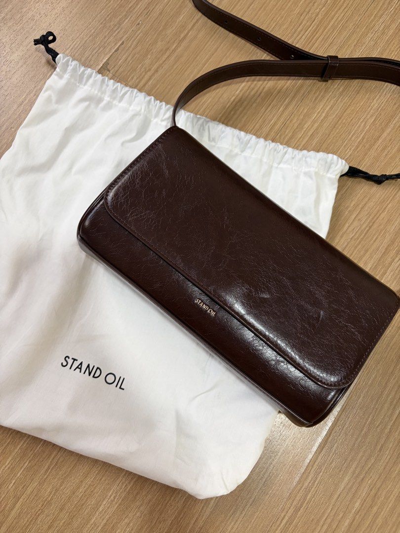 Stand Oil Brown Shoulder Bag (Category: Purses & Pouches) located in Makati City. Submitted by citysunset (Listing ID 1461661814, Image 2). Description: Korean Brand: Stand Oil Color: Dark Brown .