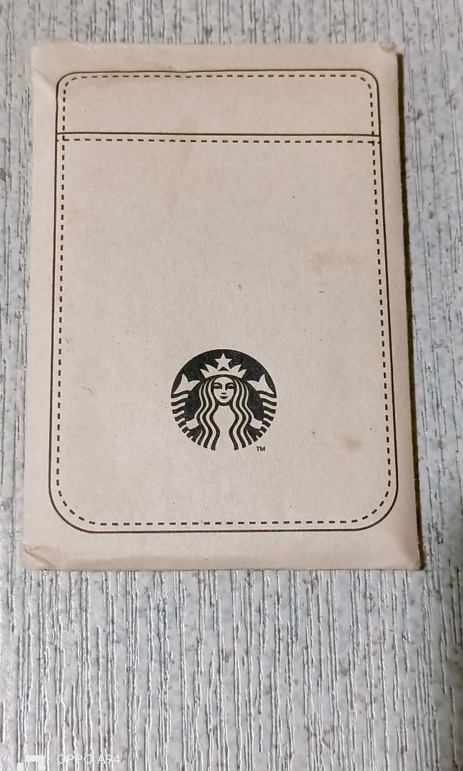 Starbucks Magsafe Magnetic Card Wallet (Category: Wallets & Card holders) located in Quezon City. Submitted by Bernz (Listing ID 1461579025, Image 3). Description: This item is a Starbucks MagSafe Magnetic Card Wallet, specifically featuring an embossed Starbucks Siren logo. [1] (https://blog.naver.com/heading100/22******1787), [2] ([External link])Key Details About the ProductFunctionality: It functions as a magnetic wallet that snaps directly o