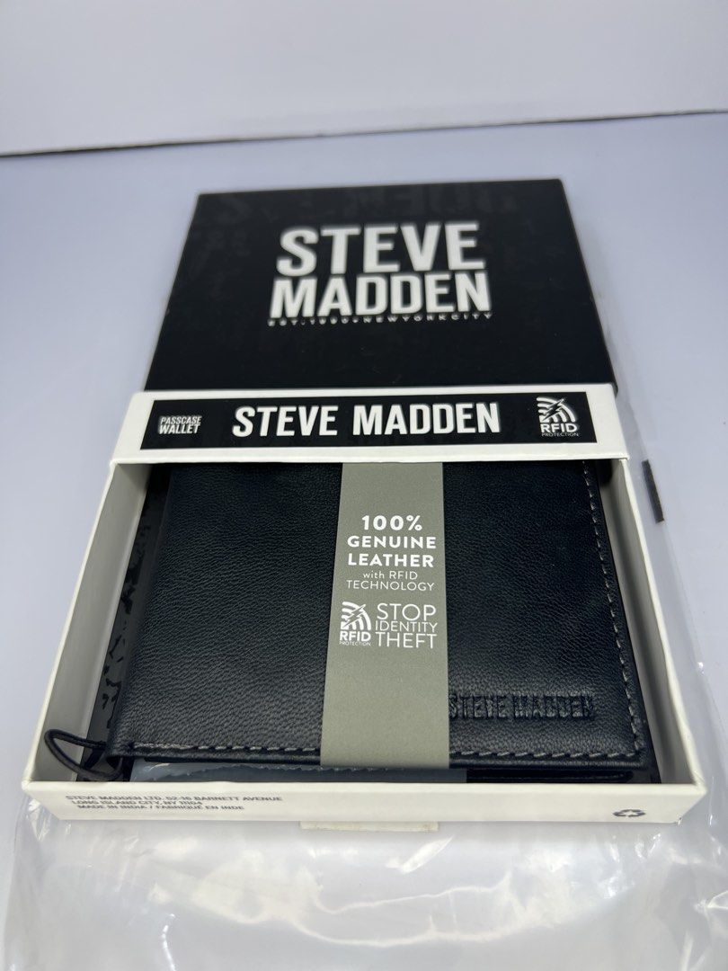 Steve Madden Black Genuine Leather RFID Blocking Bifold Wallet (Category: Wallets & Card Holders) located in Quezon City. Submitted by gigisantos (Listing ID 1461605475, Image 1). Description: - Brand: Steve Madden - Color: Black - Material: 100% Genuine Leather - Features: RFID Blocking Technology, Multiple Card Slots, Bill Compartment - Condition: Brand New (in original packaging) 100% original from USA/Canada Brand new Moneyback guarantee if p