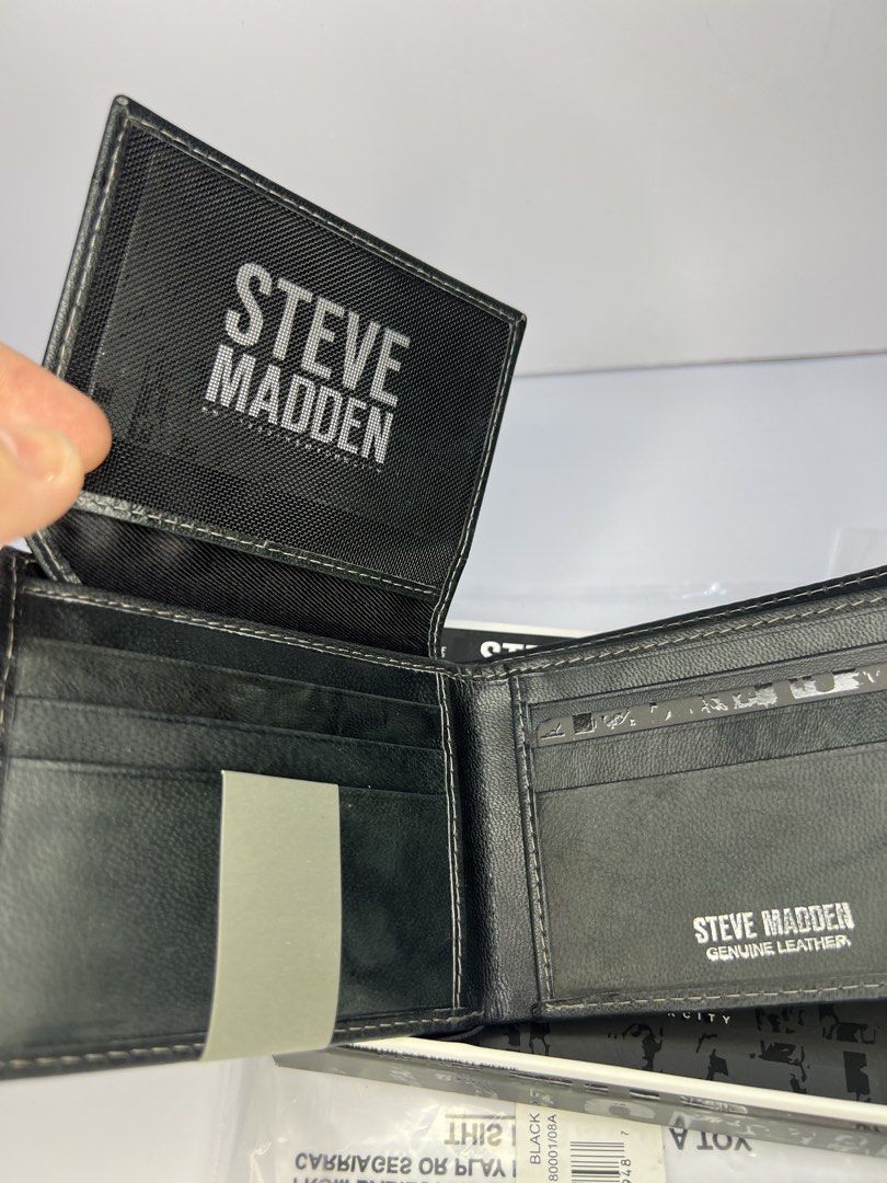 Steve Madden Black Genuine Leather RFID Blocking Bifold Wallet (Category: Wallets & Card Holders) located in Quezon City. Submitted by gigisantos (Listing ID 1461605475, Image 3). Description: - Brand: Steve Madden - Color: Black - Material: 100% Genuine Leather - Features: RFID Blocking Technology, Multiple Card Slots, Bill Compartment - Condition: Brand New (in original packaging) 100% original from USA/Canada Brand new Moneyback guarantee if p
