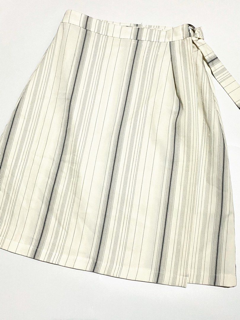 Stripe Chic Wrap Skirt (Category: Skirts) located in Trece Martires City. Submitted by serenique_wear (Listing ID 1461616502, Image 2). Description: ⋆˚꩜｡⋆ freesize till size 28 | P&H design by korea ⋆˚꩜｡⋆ mine — ₱129 ꣑ৎ Please swipe through every photos carefully or check the comments for more info, close-ups, and minor flaws before purchasing 💌 Feel free to reach out via DM if you have questions or want a better look at the item ˶ᵔ ᵕ ᵔ˶.