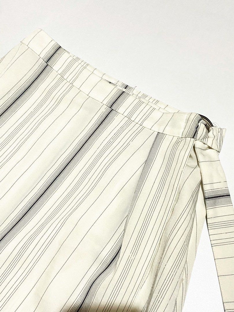 Stripe Chic Wrap Skirt (Category: Skirts) located in Trece Martires City. Submitted by serenique_wear (Listing ID 1461616502, Image 3). Description: ⋆˚꩜｡⋆ freesize till size 28 | P&H design by korea ⋆˚꩜｡⋆ mine — ₱129 ꣑ৎ Please swipe through every photos carefully or check the comments for more info, close-ups, and minor flaws before purchasing 💌 Feel free to reach out via DM if you have questions or want a better look at the item ˶ᵔ ᵕ ᵔ˶.