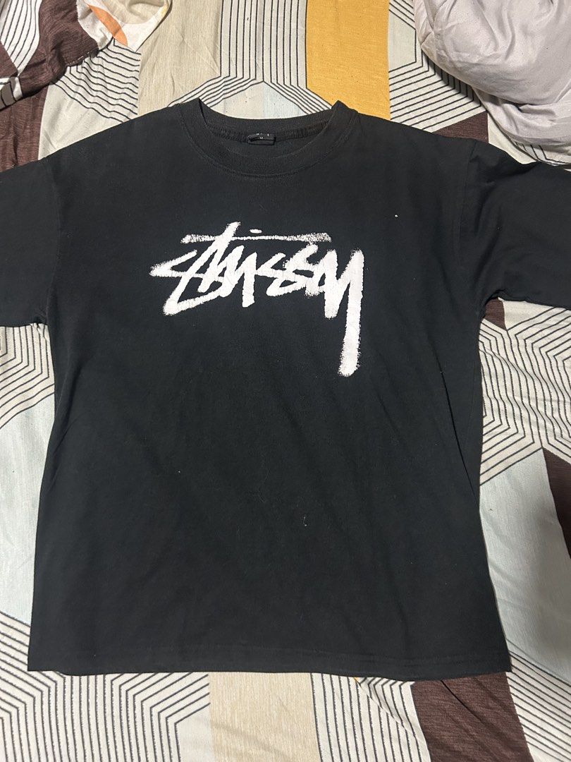 Stussy Black T-Shirt Size M (Category: Tshirts & Polo Shirts ) located in Manila. Submitted by anton_dsdd (Listing ID 1461685228, Image 1). Description: - Classic black Stussy t-shirt - Features the iconic Stussy logo on the front - Size: Medium (M) - Ideal for everyday wear - Simple and stylish design 20x27.