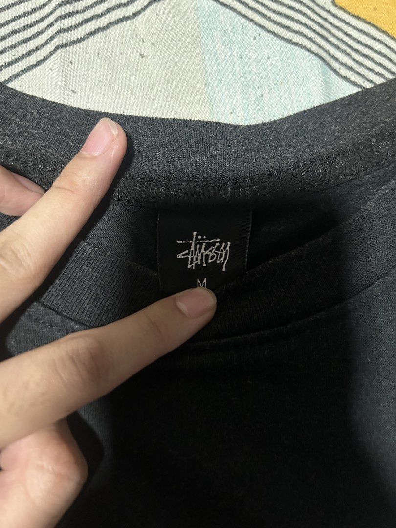 Stussy Black T-Shirt Size M (Category: Tshirts & Polo Shirts ) located in Manila. Submitted by anton_dsdd (Listing ID 1461685228, Image 2). Description: - Classic black Stussy t-shirt - Features the iconic Stussy logo on the front - Size: Medium (M) - Ideal for everyday wear - Simple and stylish design 20x27.