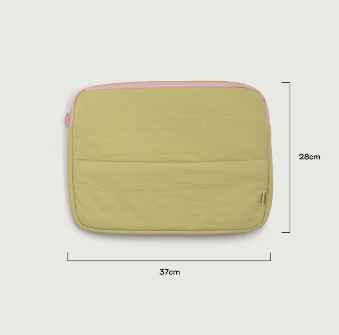 Sunnies Studios Lightweight Puffy Laptop Sleeve (Category: Laptop Bags & Sleeves) located in Dumangas. Submitted by tincajipo16 (Listing ID 1461577341, Image 3). Description: - Lightweight puffy laptop sleeve by Sunnies Studios - Made from durable nylon - Fits most 13", 14", and 15" laptops - Features a waterproof zipper for extra protection - Includes an elastic strap for convenient carrying - Available in Taffy, Durian, and Blackberry - Dimensi