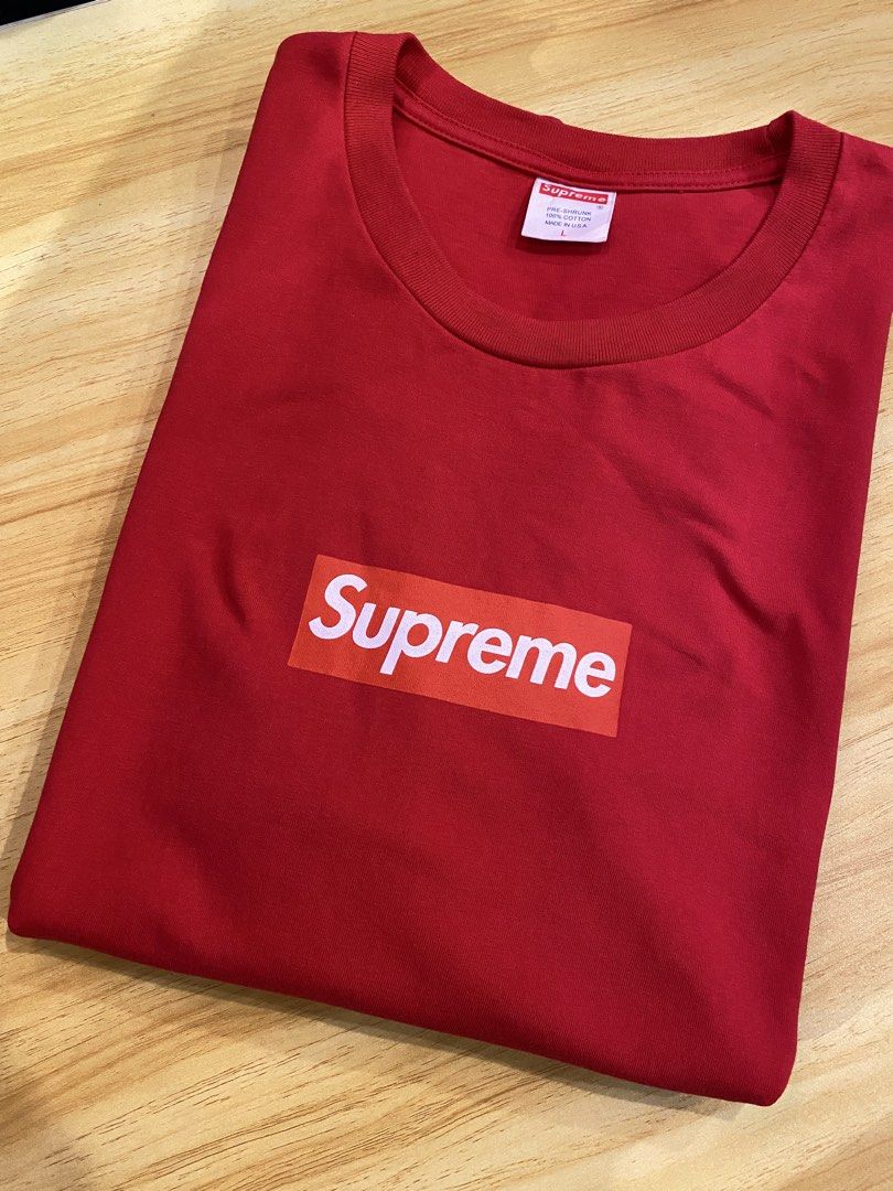 Supreme Red Box Logo T-Shirt (Category: Tshirts & Polo Shirts ) located in Manila. Submitted by thriftvibes324 (Listing ID 1461576454, Image 1). Description: - Classic red Supreme Box Logo Tee - Size: Large (L) - Material: 100% Cotton - Origin: Made in USA - Perfect for everyday wear.