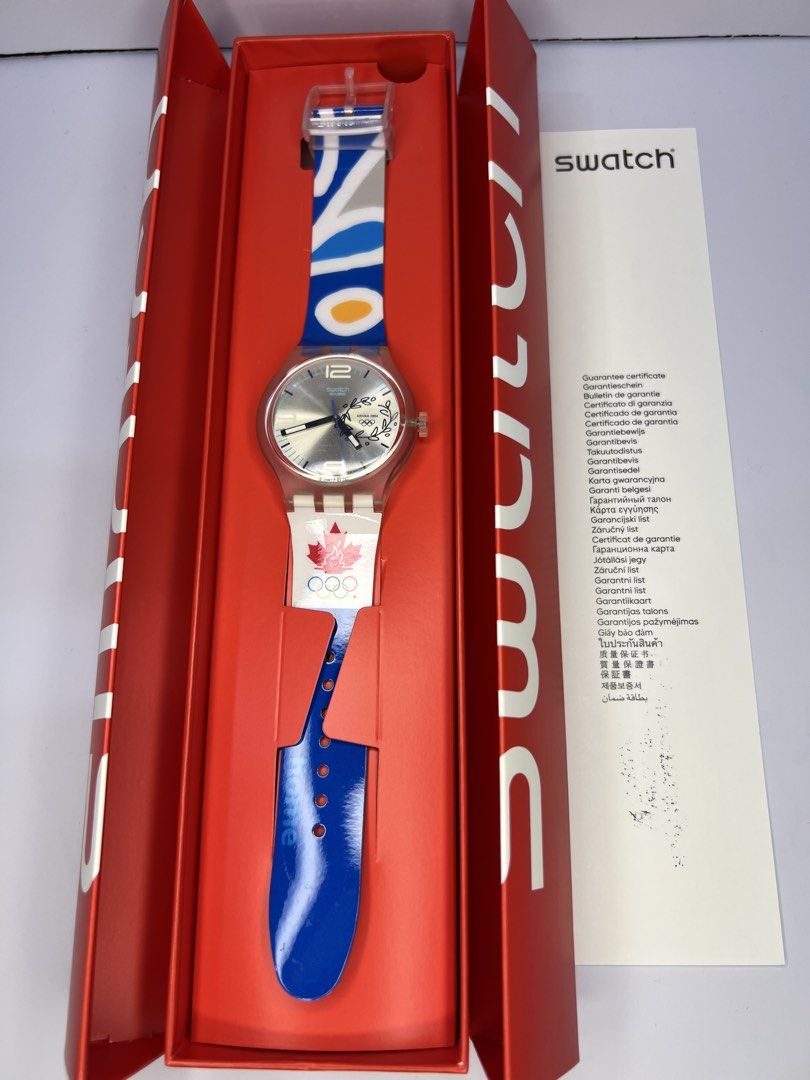 Swatch Olympic Watch with Box and Papers Unisex (Category: Men's Watches) located in Quezon City. Submitted by gigisantos (Listing ID 1461606576, Image 1). Description: - Authentic Swatch Watch - Olympics Collection - Blue and white strap with iconic Olympic rings - Includes original red Swatch box - Comes with guarantee certificate - Purchase receipt from Hour Passion Outlet, Vancouver, BC (dated Aug 5, 2026) 100% original from USA/Canada Brand 