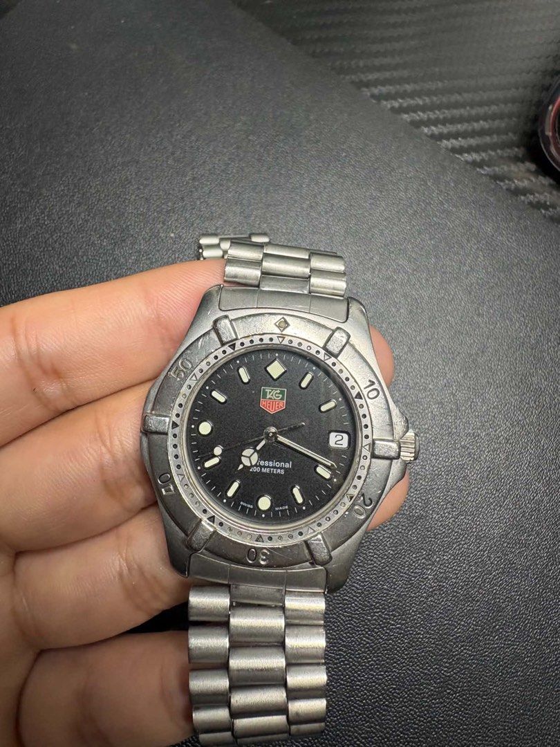 TAG Heuer 2000 Series Professional 200M – Ref. 962.006R (Category: Men's Watches) located in Manila. Submitted by siggyy (Listing ID 1461760171, Image 1). Description: Swiss Quartz Movement | 38mm Stainless Steel Case | Sapphire Crystal | 200M Water Resistance | Black Dial with Date | Unidirectional Rotating Bezel | Stainless Steel Bracelet Condition: Pre-owned. Shows visible scratches and signs of wear due to age and previous use. NEGOTIABLE!.