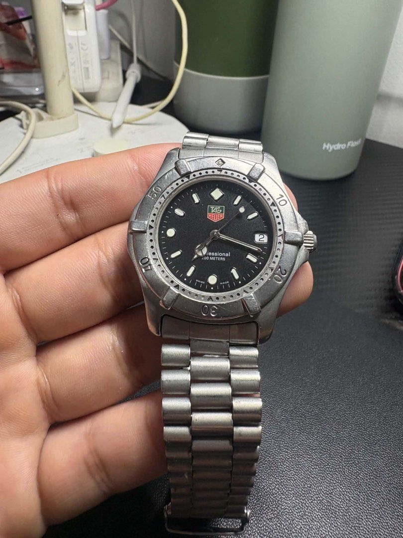 TAG Heuer 2000 Series Professional 200M – Ref. 962.006R (Category: Men's Watches) located in Manila. Submitted by siggyy (Listing ID 1461760171, Image 2). Description: Swiss Quartz Movement | 38mm Stainless Steel Case | Sapphire Crystal | 200M Water Resistance | Black Dial with Date | Unidirectional Rotating Bezel | Stainless Steel Bracelet Condition: Pre-owned. Shows visible scratches and signs of wear due to age and previous use. NEGOTIABLE!.