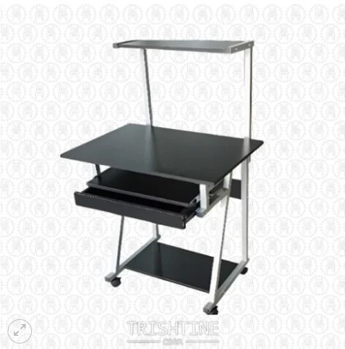 TCOM-001 | Computer Table with Tray, Drawer, Top & Bottom Layer (Category: Office Furniture & Fixtures) located in Caloocan City. Submitted by jimkirt.tristine.ph (Listing ID 1461655751, Image 1). Description: Materials & Features: with pull-out drawer keyboard tray printers stand / CPU bin tubular frame Dimension: H116 W53 L68 cm Finish: black, wenge DISCLAIMER: PRICE IS FOR POSTING PURPOSES ONLY.