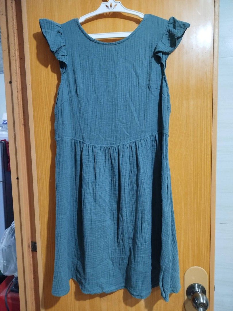 Teal Gauze Ruffle Sleeve Button Front Dress (Category: Dresses) located in Quezon City. Submitted by niceoutfits (Listing ID 1461600776, Image 3). Description: - Adorable teal dress - Brand new ( old stock) - Size : Xs - Gauze-like texture - Fluttery ruffle sleeves - Button-down front - Gathered waistline - Relaxed, flowing skirt - Comfortable and breathable - Ideal for casual outings.