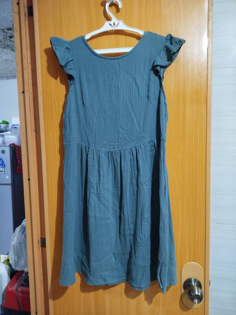Teal Gauze Ruffle Sleeve Button Front Dress (Category: Dresses) located in Quezon City. Submitted by niceoutfits (Listing ID 1461600776, Image 1). Description: - Adorable teal dress - Brand new ( old stock) - Size : Xs - Gauze-like texture - Fluttery ruffle sleeves - Button-down front - Gathered waistline - Relaxed, flowing skirt - Comfortable and breathable - Ideal for casual outings.