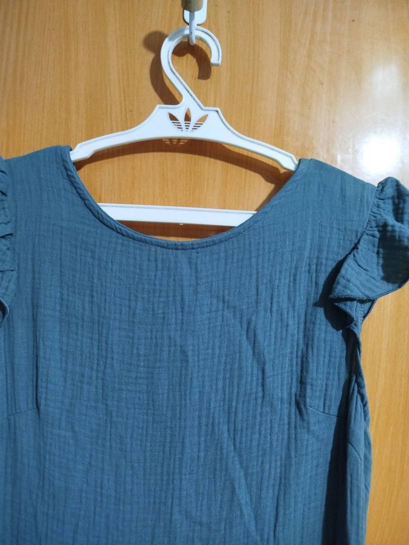Teal Gauze Ruffle Sleeve Button Front Dress (Category: Dresses) located in Quezon City. Submitted by niceoutfits (Listing ID 1461600776, Image 2). Description: - Adorable teal dress - Brand new ( old stock) - Size : Xs - Gauze-like texture - Fluttery ruffle sleeves - Button-down front - Gathered waistline - Relaxed, flowing skirt - Comfortable and breathable - Ideal for casual outings.