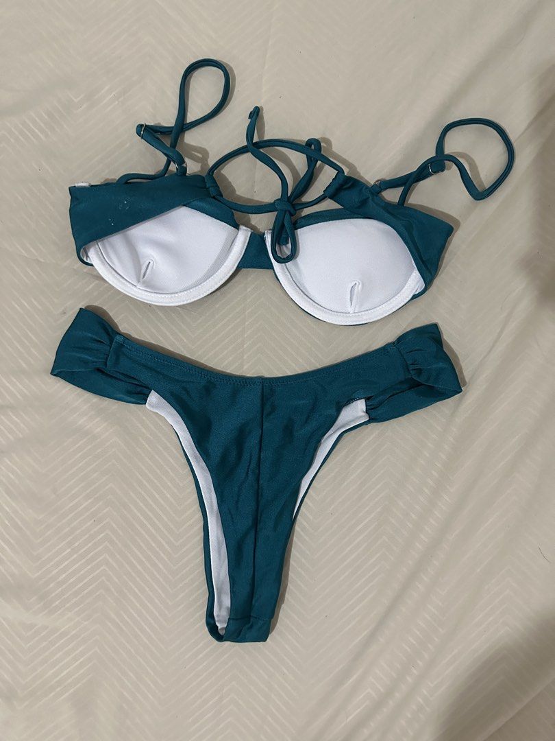 Teal Push-Up Bikini Set with Thong Bottoms (Category: Bikinis & Swimsuits) located in Lipa City. Submitted by chiechums (Listing ID 1461569082, Image 2). Description: - Teal bikini set - Push-up bra top with adjustable straps - Thong bottoms with ruched sides - White lining inside - Ideal for beach or pool days - Comfortable and stylish design.