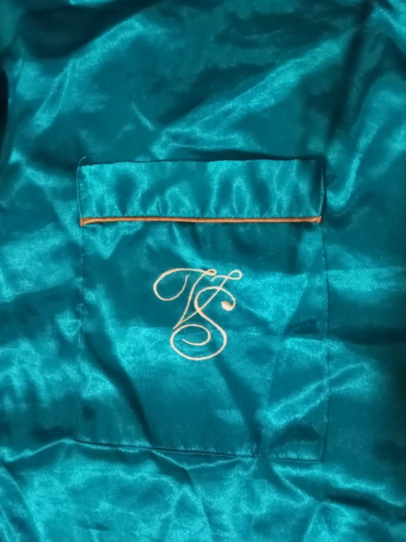 Teal Satin Pajama Shirt with Monogram (Category: Shirts) located in Manila. Submitted by caaths_collection (Listing ID 1461778061, Image 3). Description: - Long sleeves with button cuffs - Embroidered 'TS' monogram on chest pocket - Classic button-up front - Smooth, silky fabric for ultimate comfort - Perfect for sleepwear or stylish lounging.