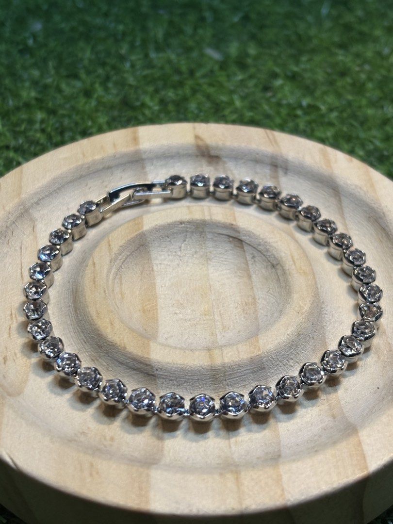 Tennis bracelet silver tone with stone (Category: Bracelets) located in Davao. Submitted by ememlou17 (Listing ID 1461749518, Image 2). Description: Tennis bracelet size 7-7.5inches Rhodium/platinum plated over copper setting #japanjewelries #japansurplus #japanuk.