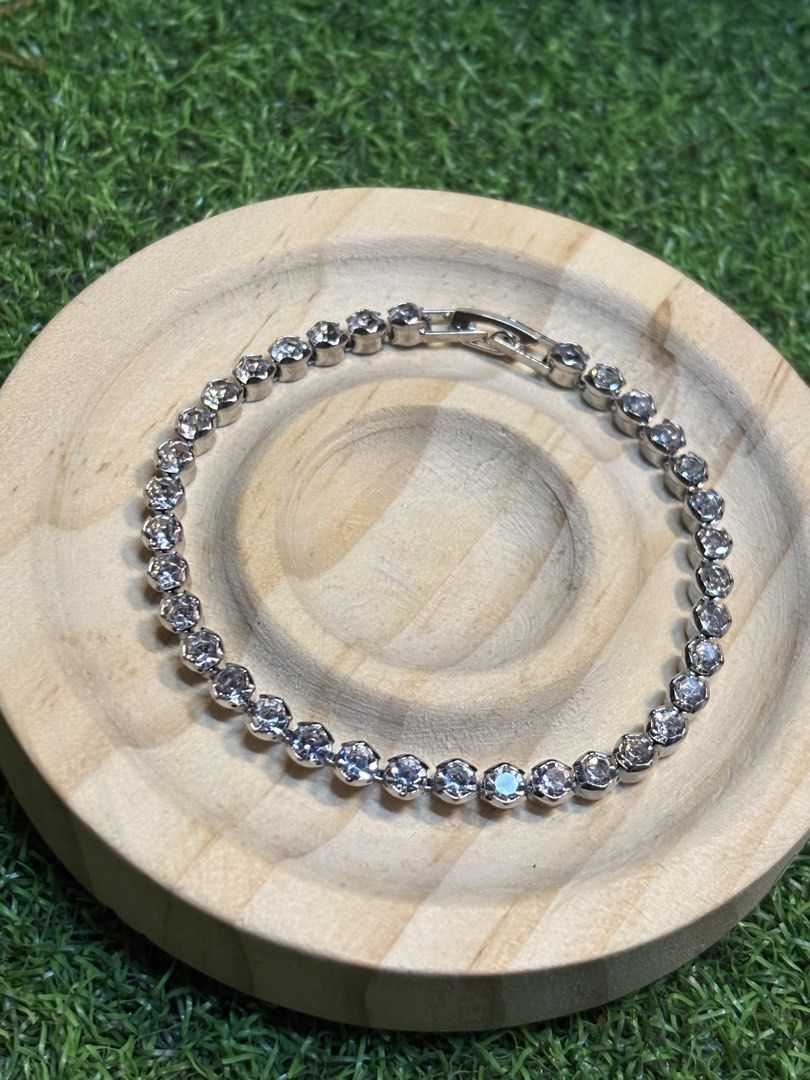 Tennis bracelet silver tone with stone (Category: Bracelets) located in Davao. Submitted by ememlou17 (Listing ID 1461749518, Image 1). Description: Tennis bracelet size 7-7.5inches Rhodium/platinum plated over copper setting #japanjewelries #japansurplus #japanuk.