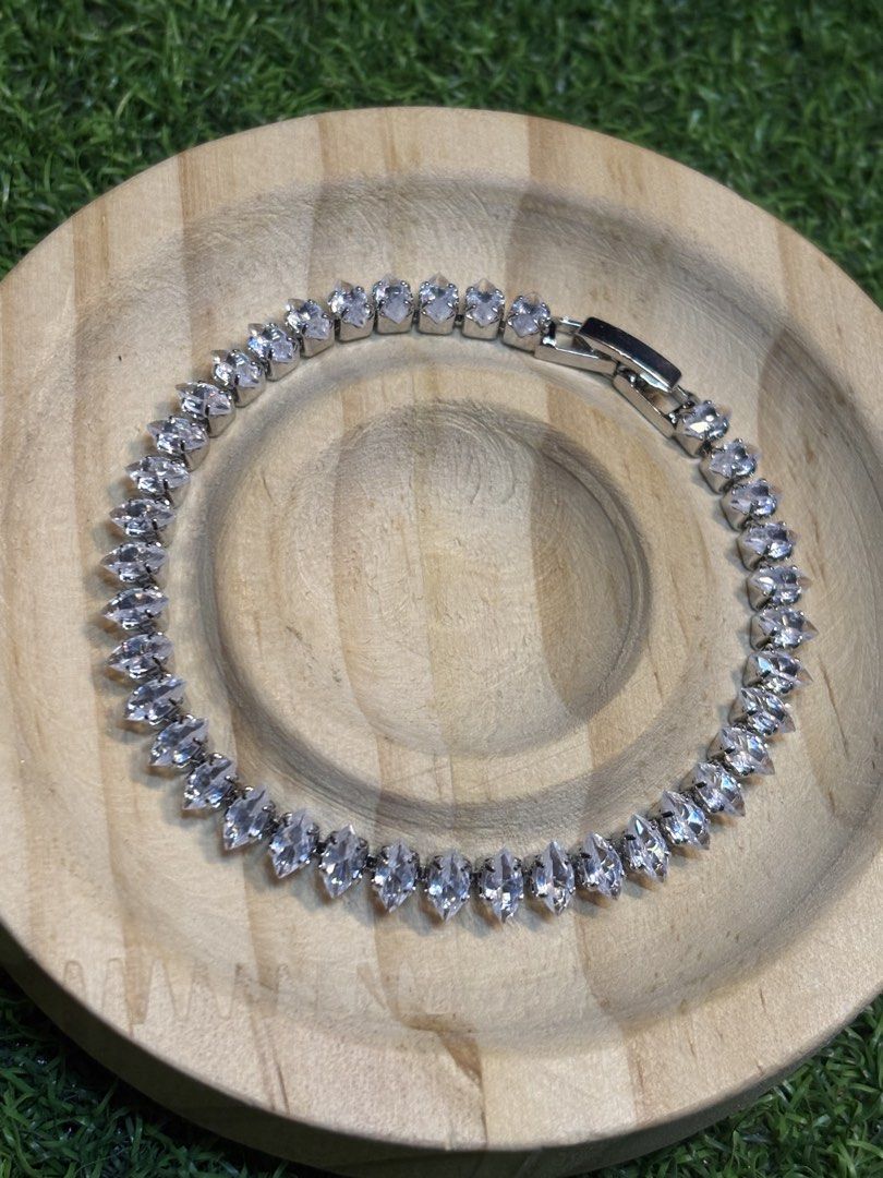 Tennis bracelet silver tone with stone (Category: Bracelets) located in Davao. Submitted by ememlou17 (Listing ID 1461749848, Image 2). Description: Tennis bracelet size 7-7.5inches Rhodium/platinum plated over copper setting #japanjewelries #japansurplus #japanuk.