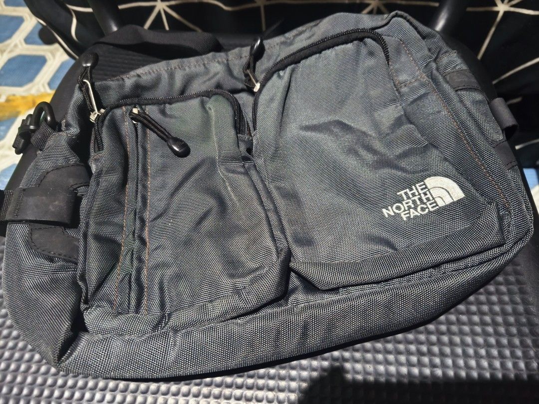 The North Face Grey Sling Bag (Category: Sling Bags) located in Quezon City. Submitted by kisstin18 (Listing ID 1461602829, Image 1). Description: - The North Face grey sling bag - Multiple pockets for organization - Adjustable strap for comfort - All zippers are in good working condition - Main compartment includes an inner zip pocket - Ideal for daily use or travel.