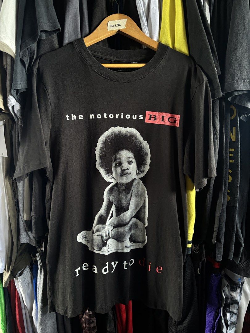 The Notorious B.I.G Shirt (Category: Tshirts & Polo Shirts ) located in Taguig. Submitted by nardselect (Listing ID 1461572316, Image 1). Description: The Notorious B.I.G Shirt Tag Size: Small Width: 20 Length: 27 Condition: Excellent Flaws: None .
