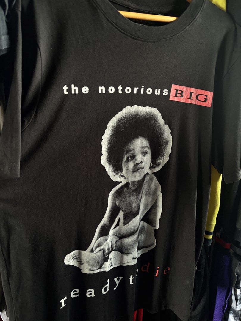 The Notorious B.I.G Shirt (Category: Tshirts & Polo Shirts ) located in Taguig. Submitted by nardselect (Listing ID 1461572316, Image 2). Description: The Notorious B.I.G Shirt Tag Size: Small Width: 20 Length: 27 Condition: Excellent Flaws: None .