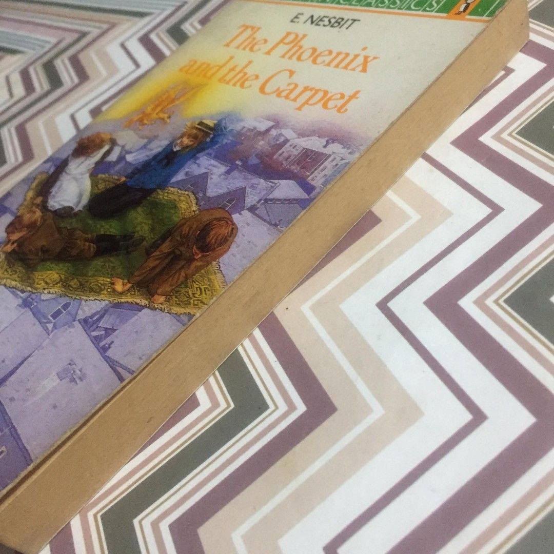 The Phoenix and the Carpet by E. Nesbit (Category: Storybooks) located in Pasig City. Submitted by sell.phi (Listing ID 1461629750, Image 3). Description: The Phoenix and the Carpet by E. Nesbit Preloved mass market paperback with creases on the covers and spine tanned inside covers, pages, and edges with small brown spots on the inside covers, first and last page.