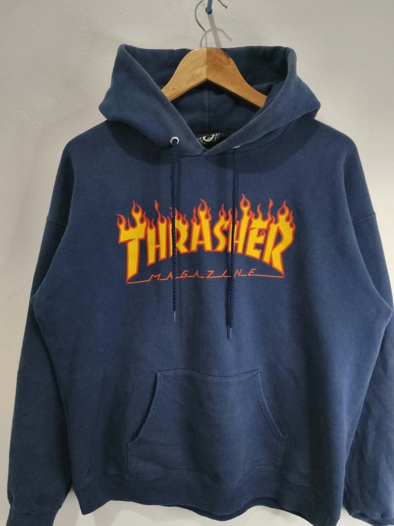Thrasher Magazine Flame Logo Hoodie (Category: Hoodies) located in Manila. Submitted by temetrius_husslin (Listing ID 1461743486, Image 1). Description: - Classic Thrasher Magazine hoodie - Iconic flame logo on the front - Navy blue color - Pullover style with front pocket - Great for everyday wear.