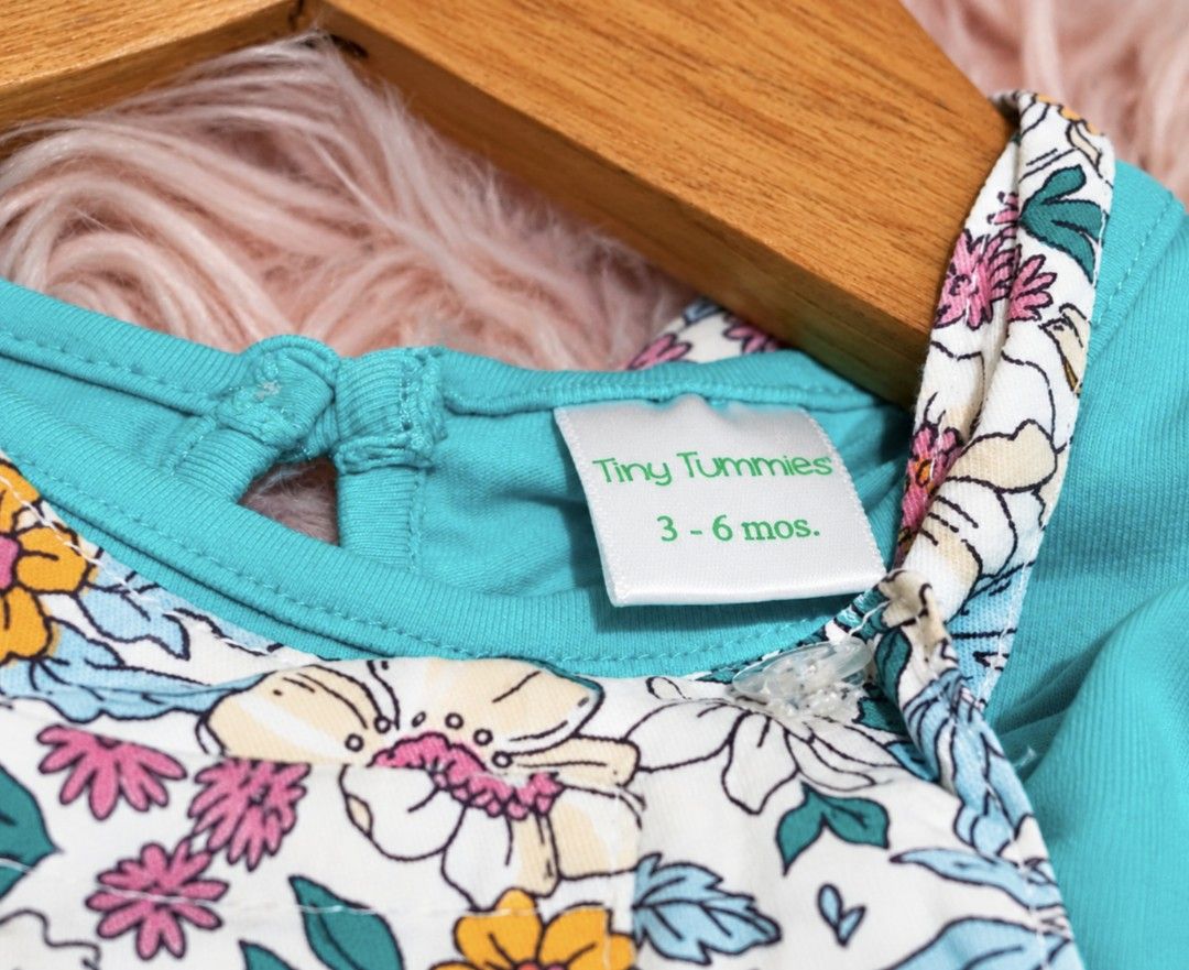 Tiny Tummies Floral Romper 3-6 Months (Category: Babies & Kids Fashion) located in Manila. Submitted by hailee_s29 (Listing ID 1461737906, Image 1). Description: - Cute floral romper from Tiny Tummies - Teal top with floral print romper - Ruffle sleeves - Criss-cross straps at the back - Button closure at the back neck - Perfect for your little one - Size: 3-6 months.