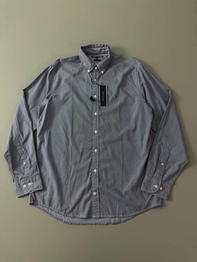 TOMMY HILFIGER (Category: Formal Shirts) located in Guagua. Submitted by sweetboyy (Listing ID 1461583635, Image 1). Description: TOMMY HILFIGER EXCELLENT CONDITION / NO ISSUE SIZE LARGE ON TAG / DIMES L30.5 W22.
