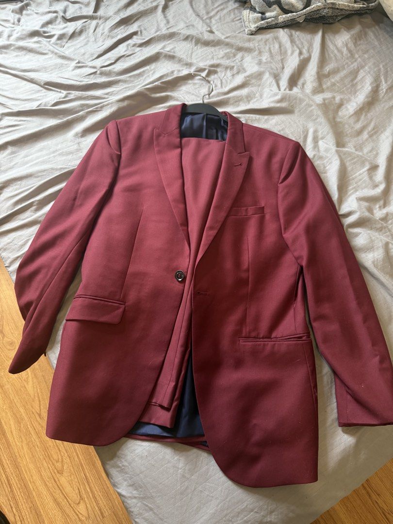 Men’s Coat (Category: Coats, Jackets and Outerwear) located in Mandaluyong City. Submitted by jamesy006 (Listing ID 1461591317, Image 1). Description: - Topman Burgundy Suit Set - Jacket Size: UK 38R - Trousers Size: UK 30S - Navy blue lining with blue trim details - Versatile for formal events or smart casual wear - Selling as a complete set.