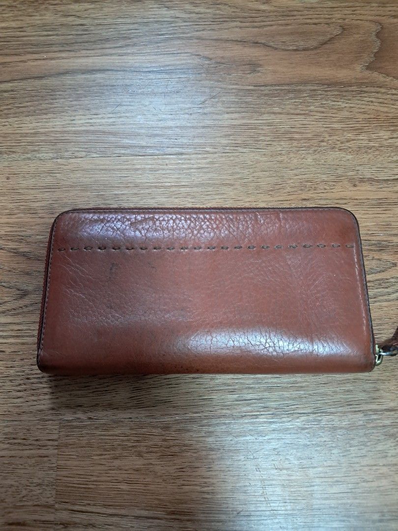 Tory Burch Long Wallet (Category: Wallets & Card holders) located in Quezon City. Submitted by dealtoshop (Listing ID 1461575285, Image 2). Description: 100 ORIGINAL. PLEASE SEE THE PHOTOS FOR YOUR REFERENCES..