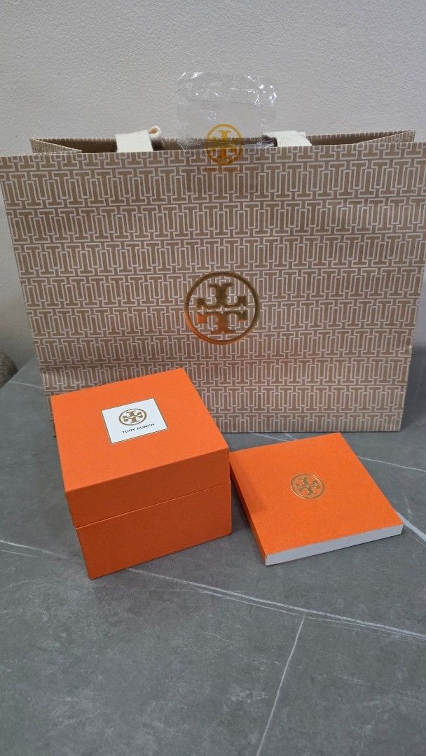 Tory Burch Watch (Brand New) (Category: Luxury Watches) located in Mandaluyong City. Submitted by ae.niceguy (Listing ID 1461785129, Image 3). Description: Tory Burch Watch TBW4033 (Brand New) Complete Unit, Box, Papers, Tag and Paper Bag Style: Reva Double Wrap Leather Size: 28MM Color: Black/Gold Material: Genuine Leather Strap SKU: TBW4033 Original Price: Php 13,250 Selling: Php 5,300- 60% OFF.
