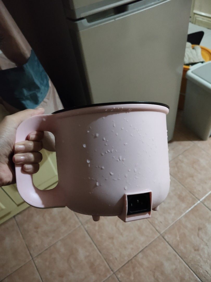 tough mama pink electric cooker multifunctional (Category: Cookers) located in Sison. Submitted by muchiberry (Listing ID 1461741887, Image 3). Description: - working 100% - has scratches on the bottom - includes wire and the silver thingy on top of it - NO COVER !!!!! - bought for 800 pesos - has 2 heat settings - negotiable.