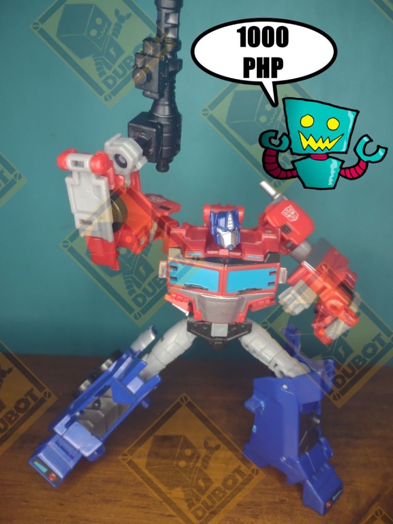 TRANSFORMERS CYBERVERSE ADVENTURES DELUXE OPTIMUS PRIME (Category: Action & Battle Toys) located in Navotas City. Submitted by christianmarkvidallo (Listing ID 1461765766, Image 3). Description: TRANSFORMERS CYBERVERSE ADVENTURES DEUXE OPTIMUS PRIME In very good condition No BAF/Weapon No Energy Blast Effect Free Energy Rifle Free Energy Sword and Shield 1000 php Item Location: Project 8, Quezon City Payment Options: Gcash/ BDO Deposit Shipping O