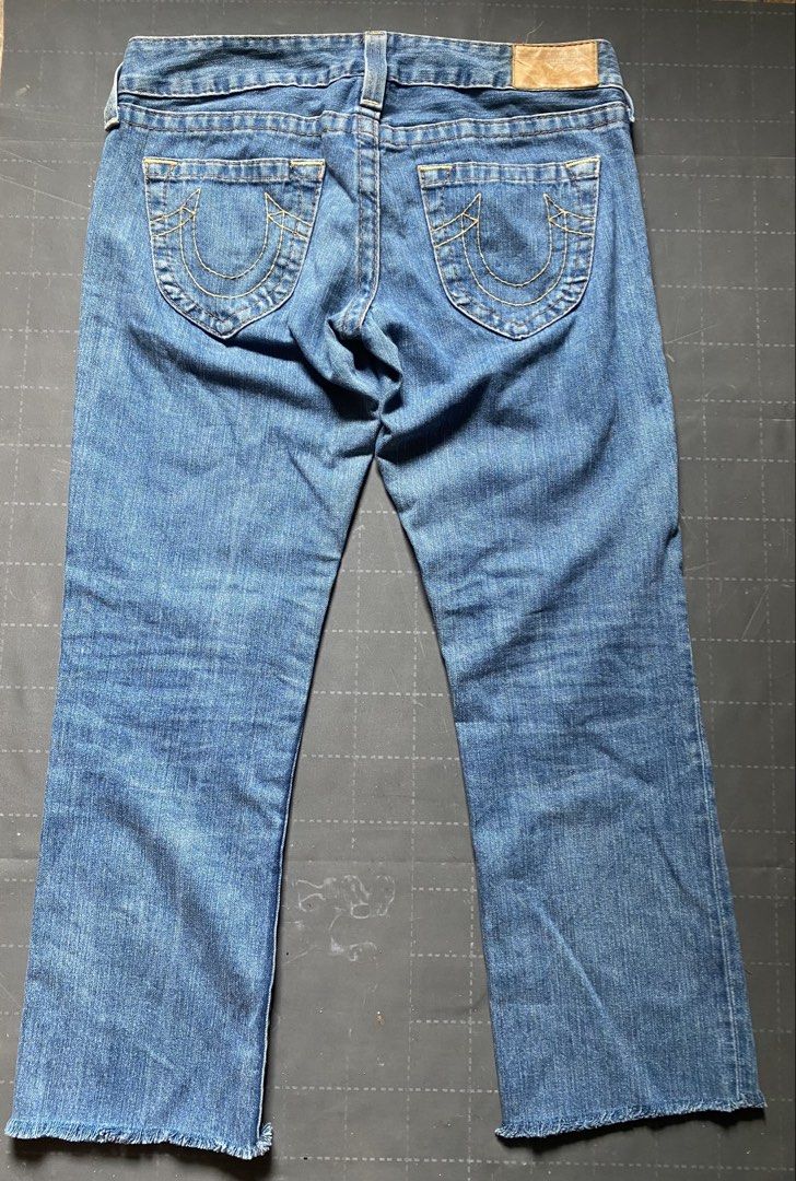 True Religion Joey Jeans Size 29 (Category: Jeans) located in Zamboanga. Submitted by trippsnthrifts (Listing ID 1461604622, Image 2). Description: - True Religion Joey Jeans - Size: 29 - Classic blue wash - Signature horseshoe stitching on back pockets - Frayed hem detail - Made in USA - Perfect staple piece for your wardrobe.