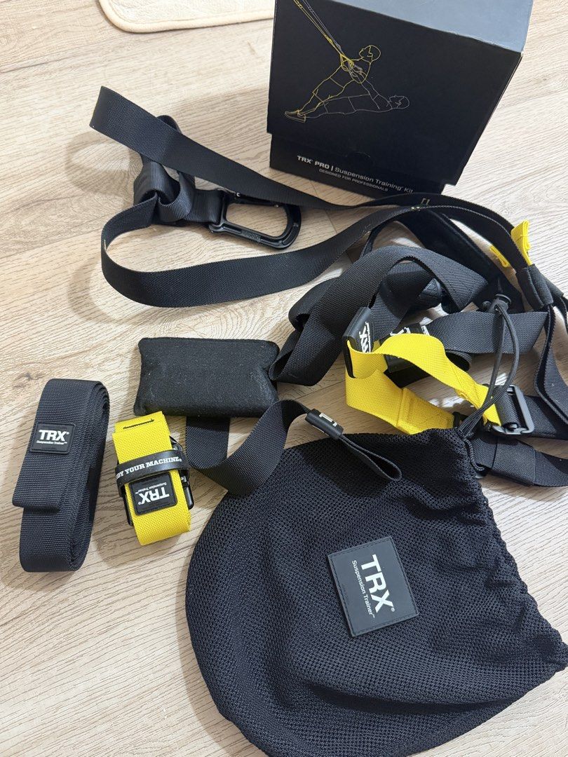 TRX PRO Suspension Training Kit (Category: Toning & Stretching Accessories) located in Singapore. Submitted by 2ofakind (Listing ID 1461675813, Image 2). Description: - TRX PRO Suspension Training Kit - Ideal for professional use - Enables full-body workouts anywhere - Includes trainer, anchors, straps, and carry bag - Highly versatile for effective training.