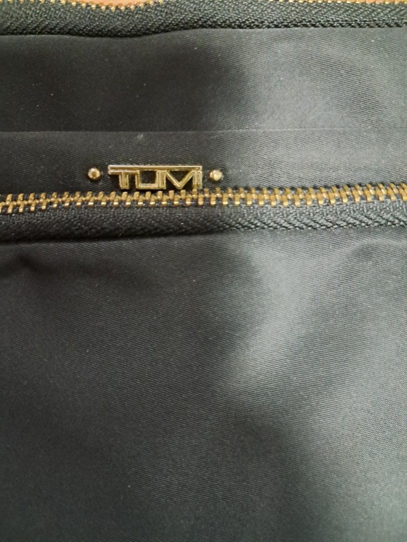 TUMI (Category: Cross-body Bags) located in Quezon City. Submitted by dealtoshop (Listing ID 1461575732, Image 3). Description: USED. PLEASE SEE THE PHOTOS FOR YOUR REFERENCES..