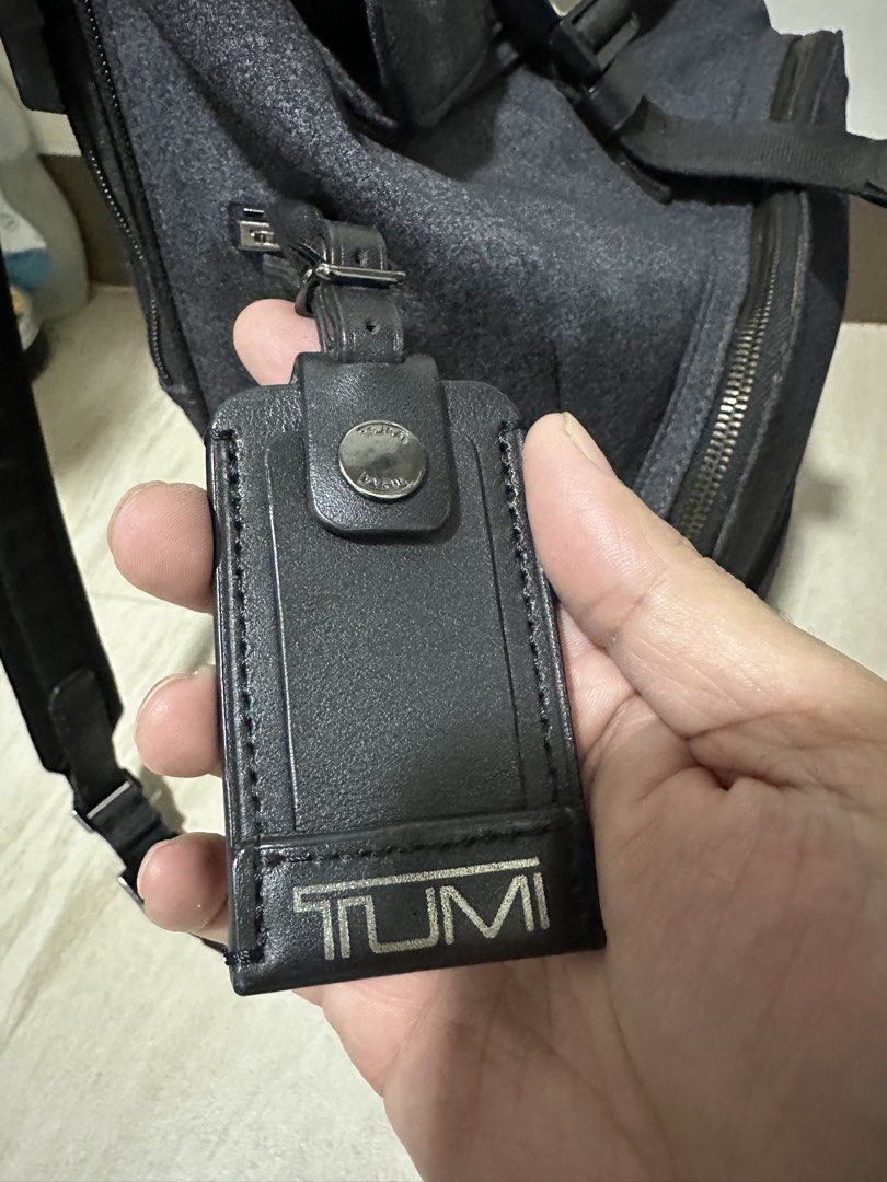 Tumi Harrison Osborn Roll Top Backpack (Category: Luxury Bags & Wallets) located in Makati City. Submitted by tanongsky (Listing ID 1461707034, Image 3). Description: About this item External Features: Foldover flap with front compression strap and speed clip, L-zip entry to main compartment, zip entry to back compartment, front U-zip pocket, side zip pocket with water-resistant lining, back quick-access pocket with magnetic snap, leather top han