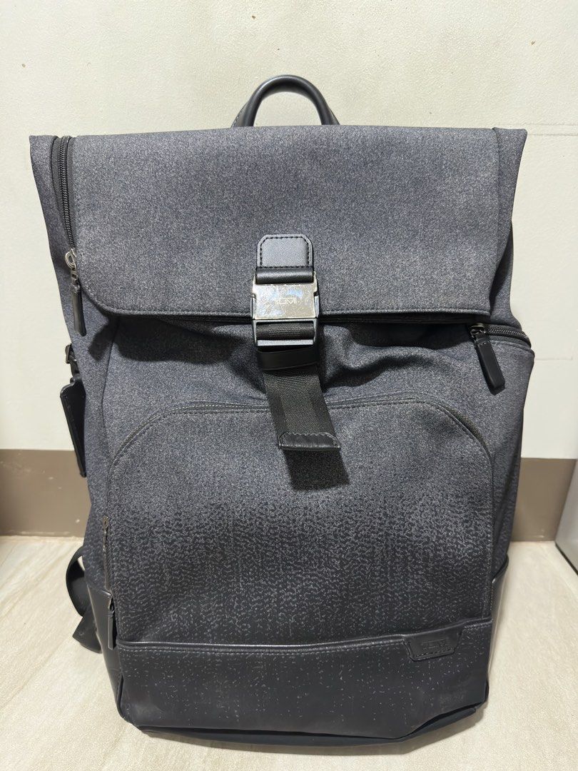 Tumi Harrison Osborn Roll Top Backpack (Category: Luxury Bags & Wallets) located in Makati City. Submitted by tanongsky (Listing ID 1461707034, Image 1). Description: About this item External Features: Foldover flap with front compression strap and speed clip, L-zip entry to main compartment, zip entry to back compartment, front U-zip pocket, side zip pocket with water-resistant lining, back quick-access pocket with magnetic snap, leather top han