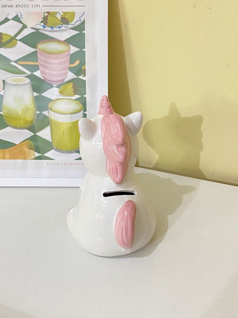 UNICORN COIN BANK/DECOR (Category: Other Home Decor) located in Dasmarinas. Submitted by hannah.oakph (Listing ID 1461752065, Image 2). Description: has a lot of crazings and doesn't have stopper (you can buy one if you want).