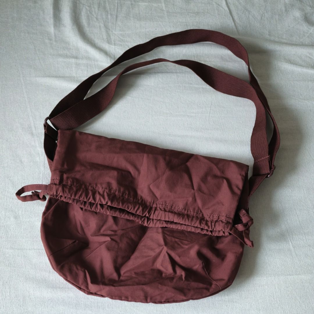 Uniqlo | U Drawstring Bag (Category: Cross-body Bags) located in Taguig. Submitted by tureesha (Listing ID 1461678281, Image 1). Description: RFS: Decluttering + Too Many Bags 📌 PLEASE READ BEFORE SENDING AN OFFER 📸 CONDITION • As described and shown in photos. Please review all photos and the description before offering. Feel free to ask for more photos or details, happy to send. ✅ ALL SALES ARE FINAL • No returns or refunds once handed over. 
