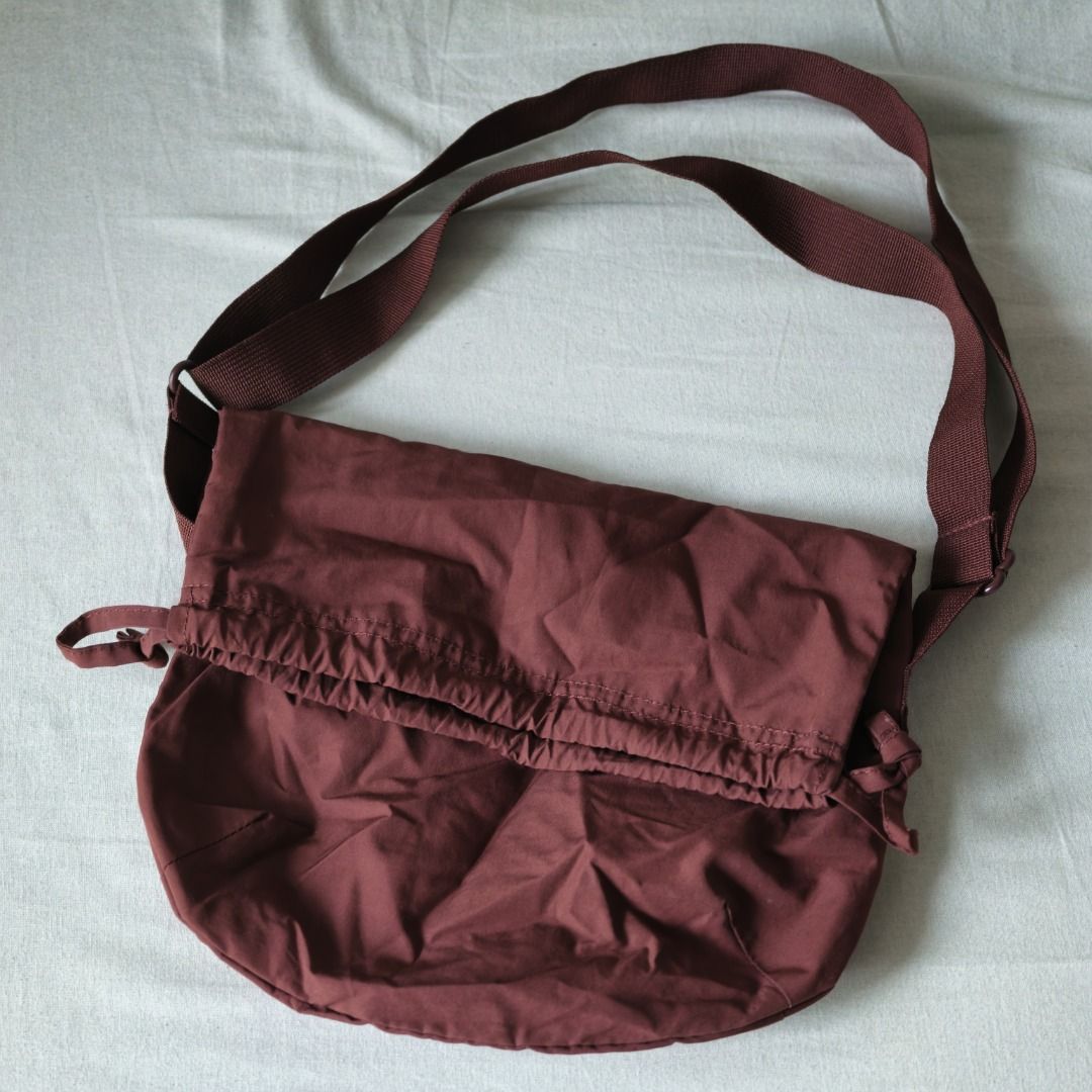 Uniqlo | U Drawstring Bag (Category: Cross-body Bags) located in Taguig. Submitted by tureesha (Listing ID 1461678281, Image 2). Description: RFS: Decluttering + Too Many Bags 📌 PLEASE READ BEFORE SENDING AN OFFER 📸 CONDITION • As described and shown in photos. Please review all photos and the description before offering. Feel free to ask for more photos or details, happy to send. ✅ ALL SALES ARE FINAL • No returns or refunds once handed over. 